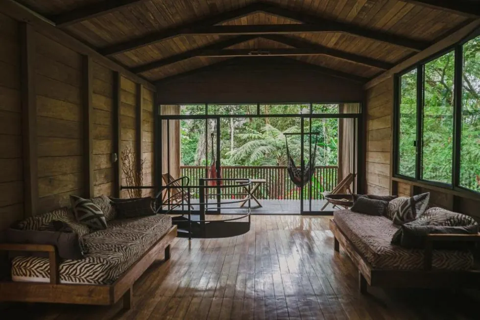 Open-air living space with forest views